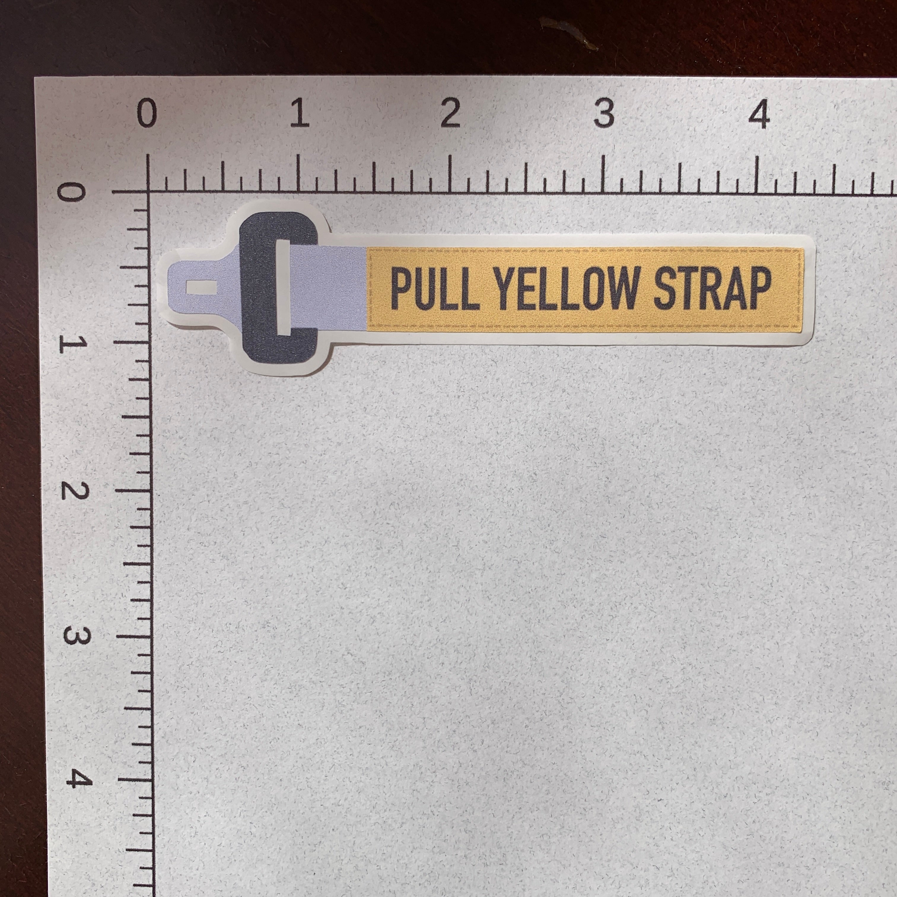 Pull Yellow Strap Sticker