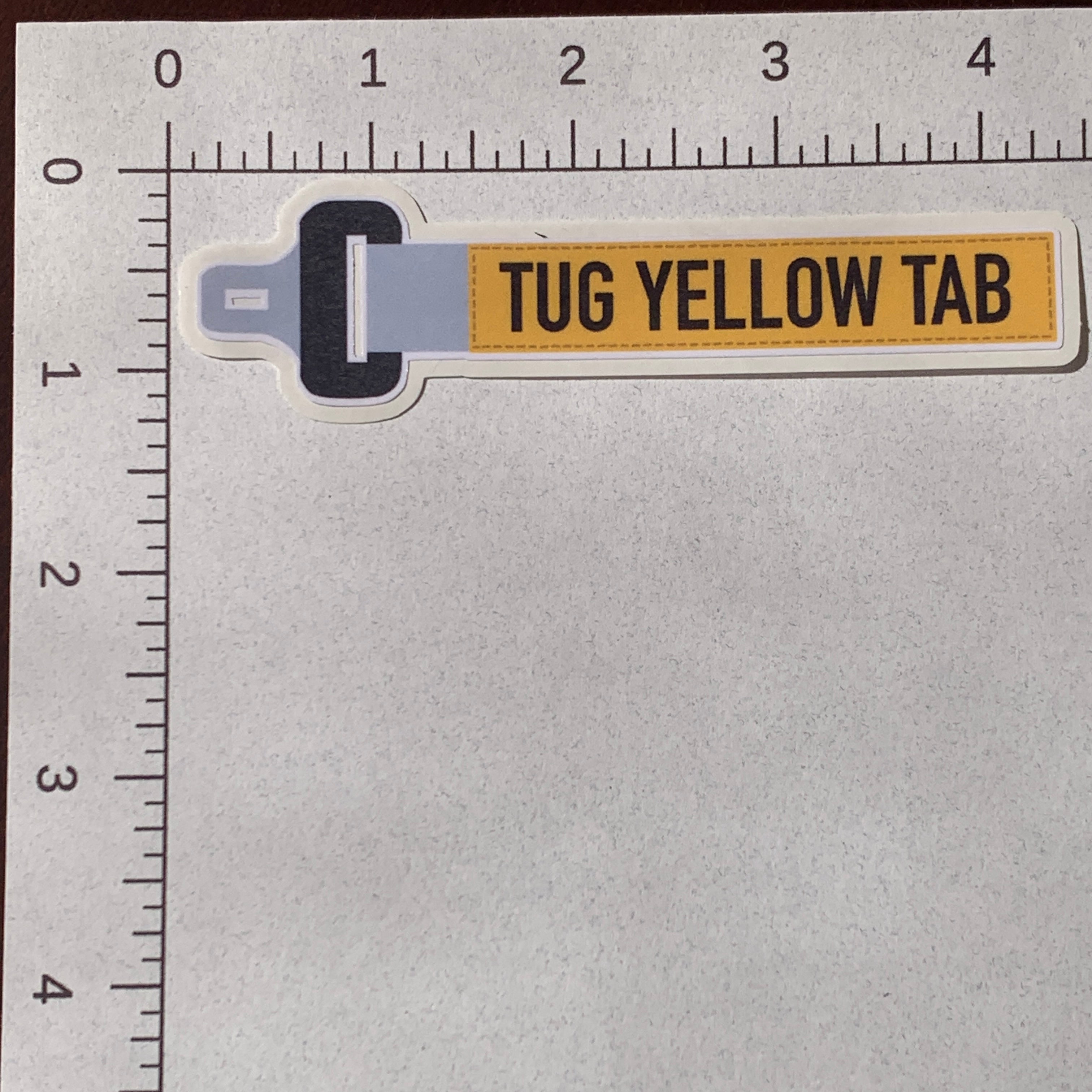 Tug Yellow Tab Sticker